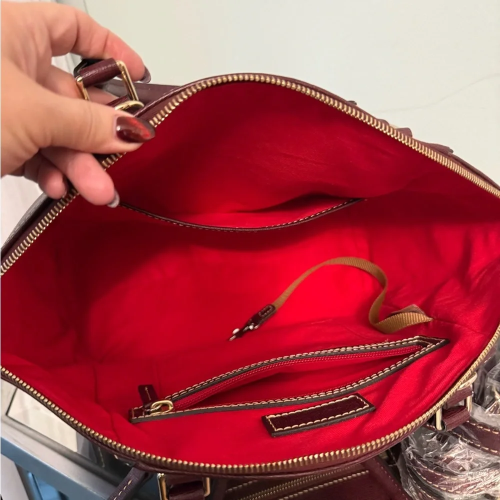 Dooney & Bourke reposhing this